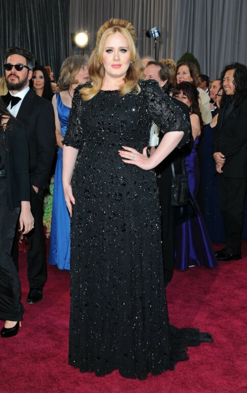 PRISVINNER: Adele har vunnet en rekke priser for musikken sin. Her under Oscar-utdelingen i 2013. Foto: NTB Scanpix PRISVINNER: Adele har vunnet en rekke priser for musikken sin. Her under Oscar-utdelingen i 2013. Foto: NTB Scanpix